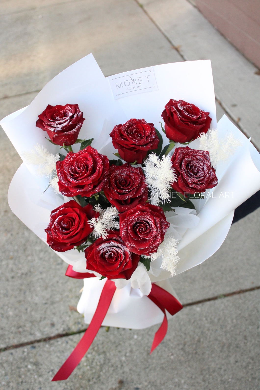 Snow Sprinkled Red Rose with Dried Fern